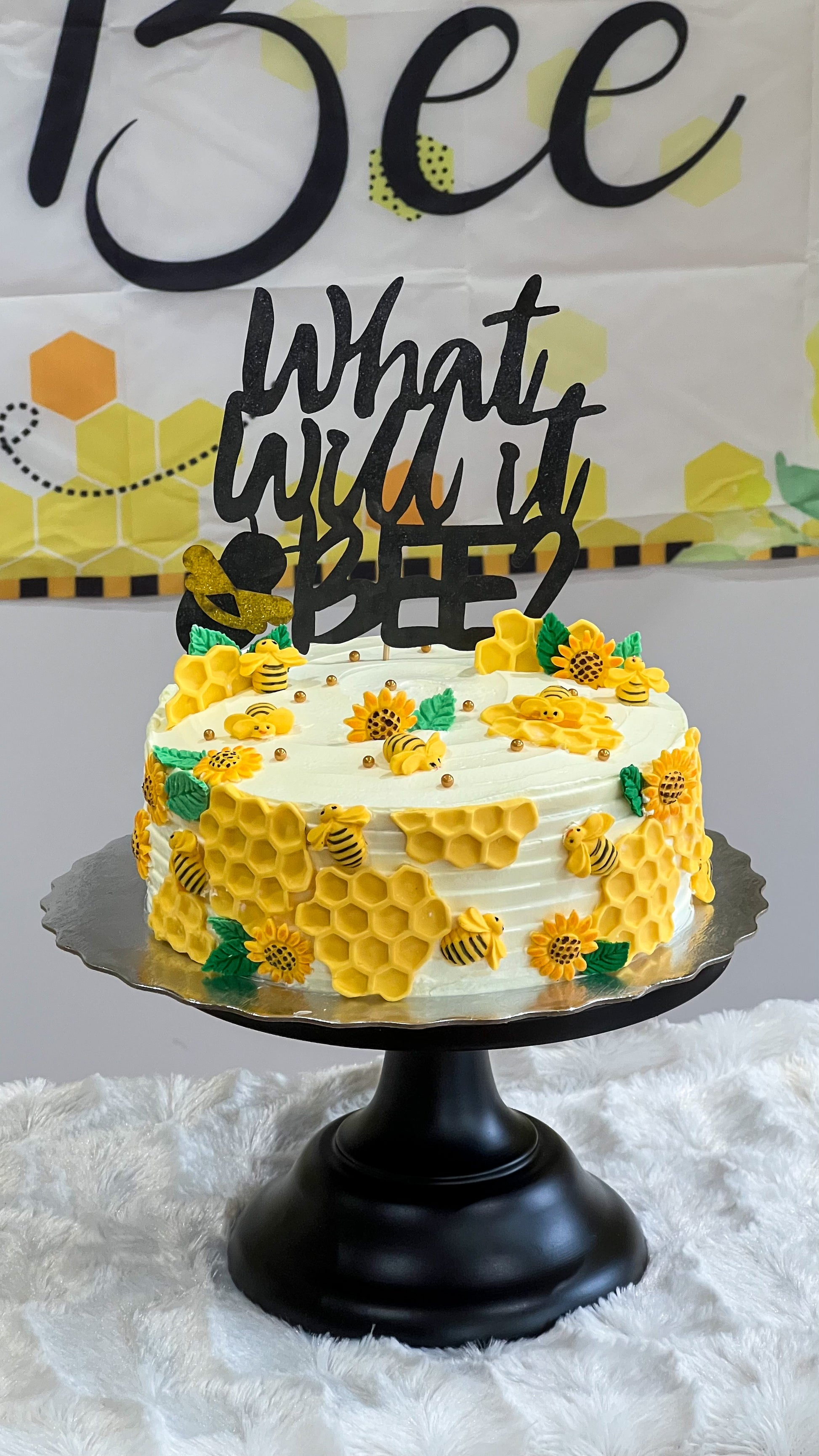 What Will It Bee gender reveal cake with hidden pink or blue centre — custom cake delivery Mississauga Brampton