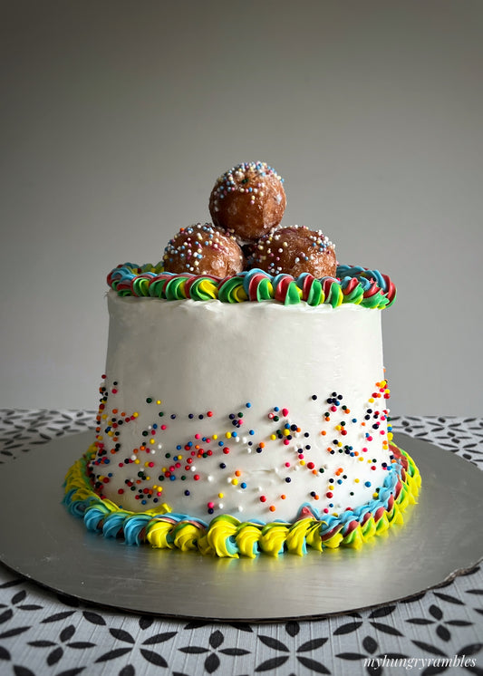 Homemade Tim-bits cake topped with Tim Hortons Timbits — fun Canadian birthday cake delivery Mississauga Brampton